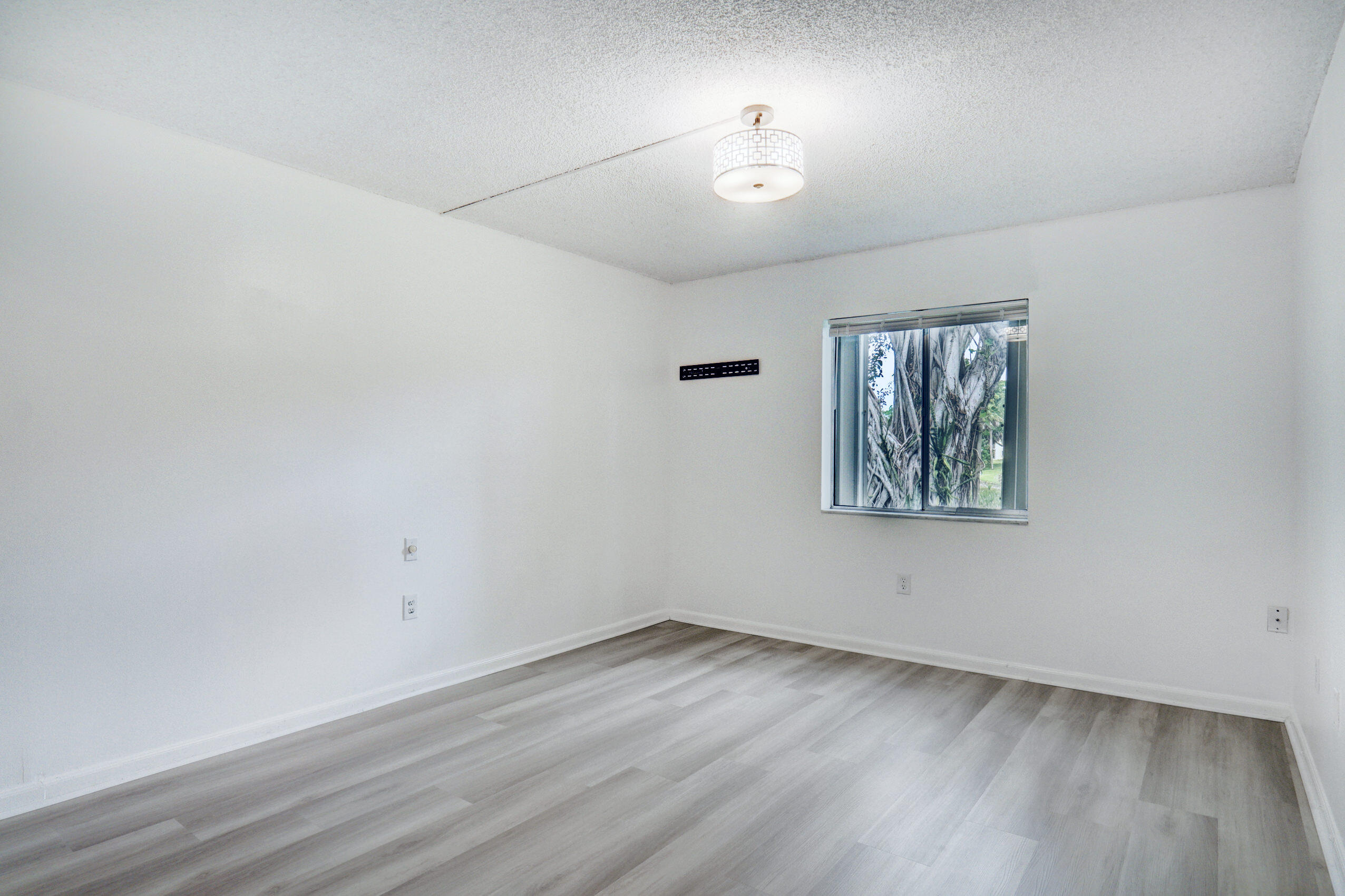866 Southwest 9th St Circle, Unit 106 Boca Raton, FL 33486 - Photo 17 of 24 Bedroom with window