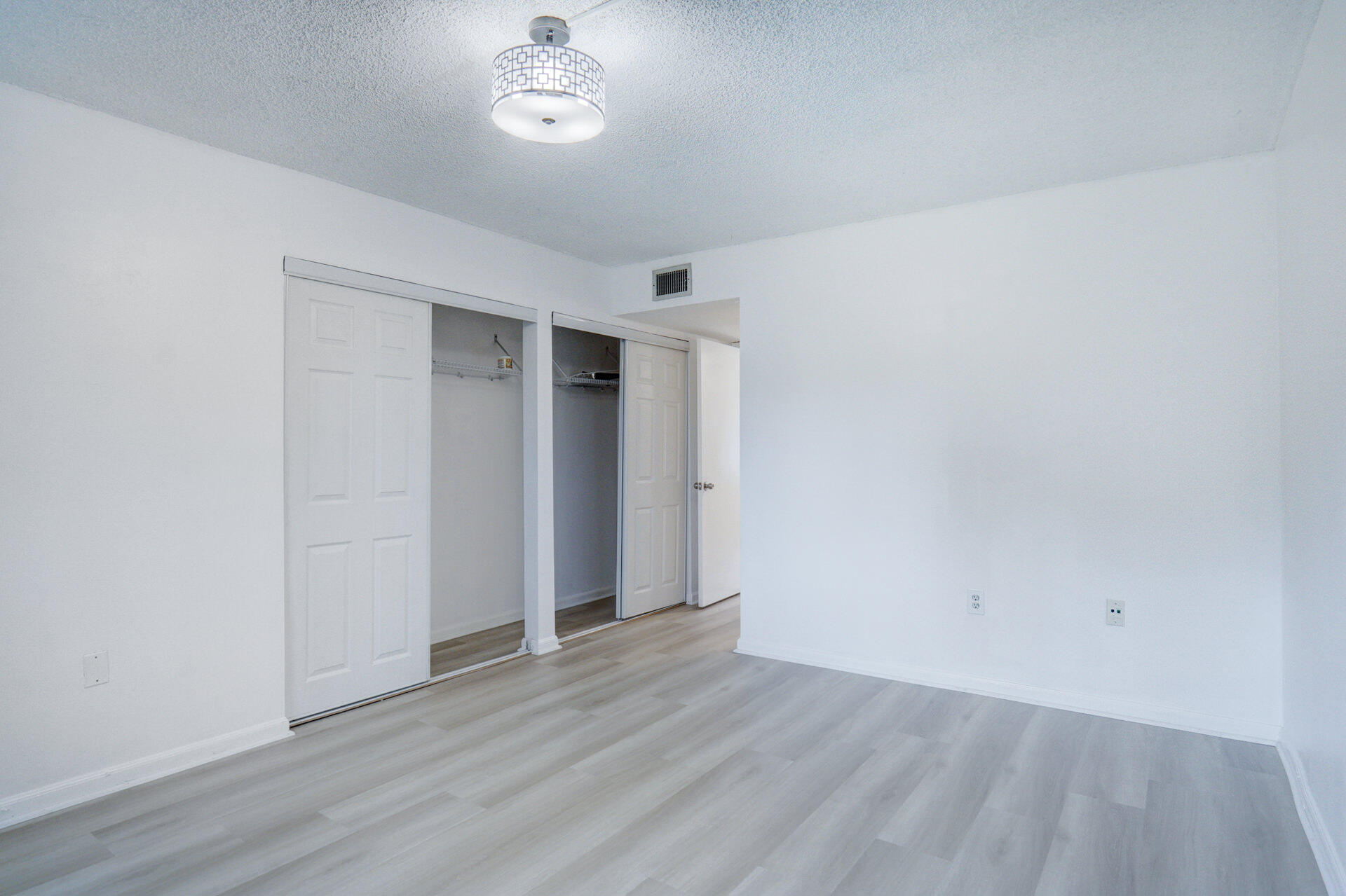866 Southwest 9th St Circle, Unit 106 Boca Raton, FL 33486 - Photo 18 of 24 Bedroom Closets