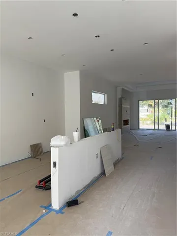 a living room with furniture and window