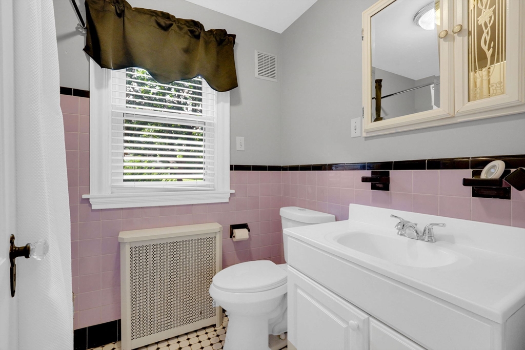 7 Longworth Road Worcester, MA 01602 - Photo 13 of 20 a bathroom with a sink and a toilet