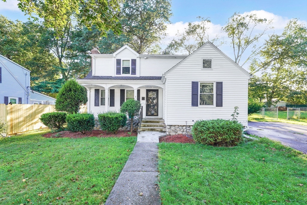 7 Longworth Road Worcester, MA 01602 - Photo 2 of 20 a front view of a house with a yard