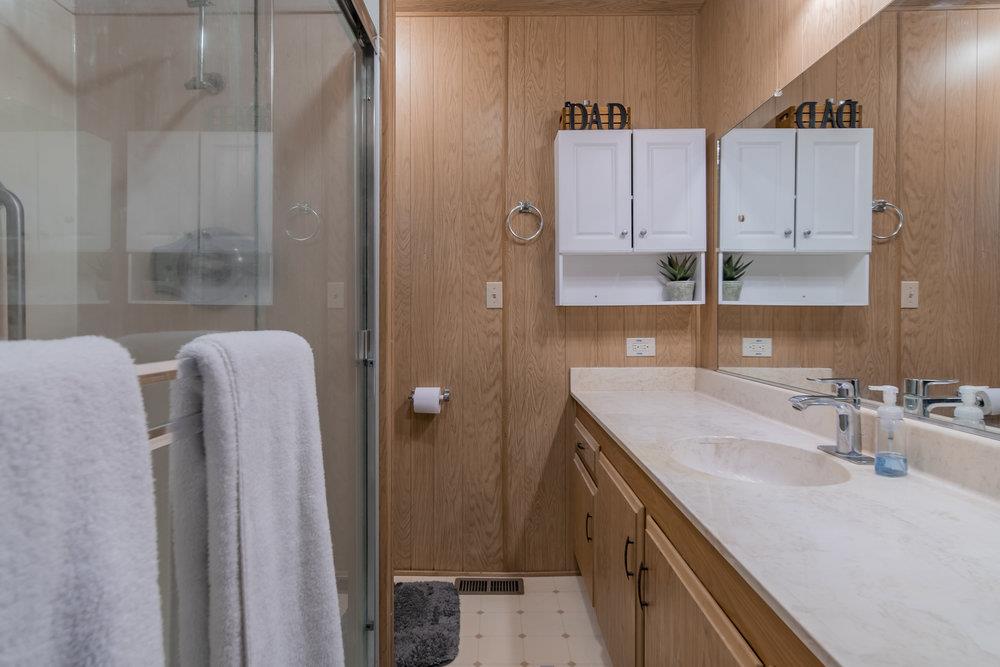 4300 Soquel Drive, Unit 220 Soquel, CA 95073 - Photo 18 of 24 a bathroom with a sink a toilet and shower