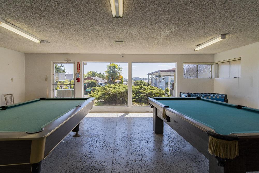 4300 Soquel Drive, Unit 220 Soquel, CA 95073 - Photo 24 of 24 a room with pool table and windows