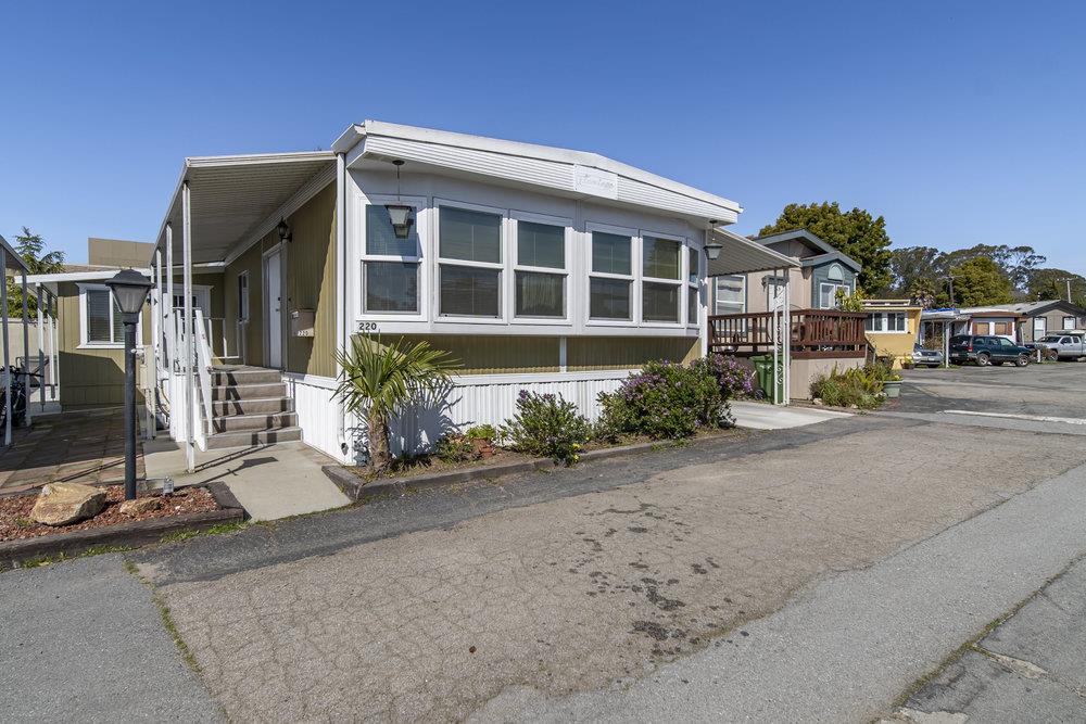 4300 Soquel Drive, Unit 220 Soquel, CA 95073 - Photo 3 of 24 a front view of a house with a yard
