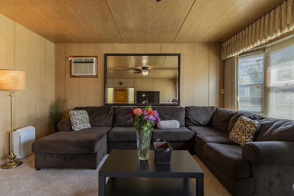 4300 Soquel Drive, Unit 220 Soquel, CA 95073 - Photo 7 of 24 a living room with furniture and a large window
