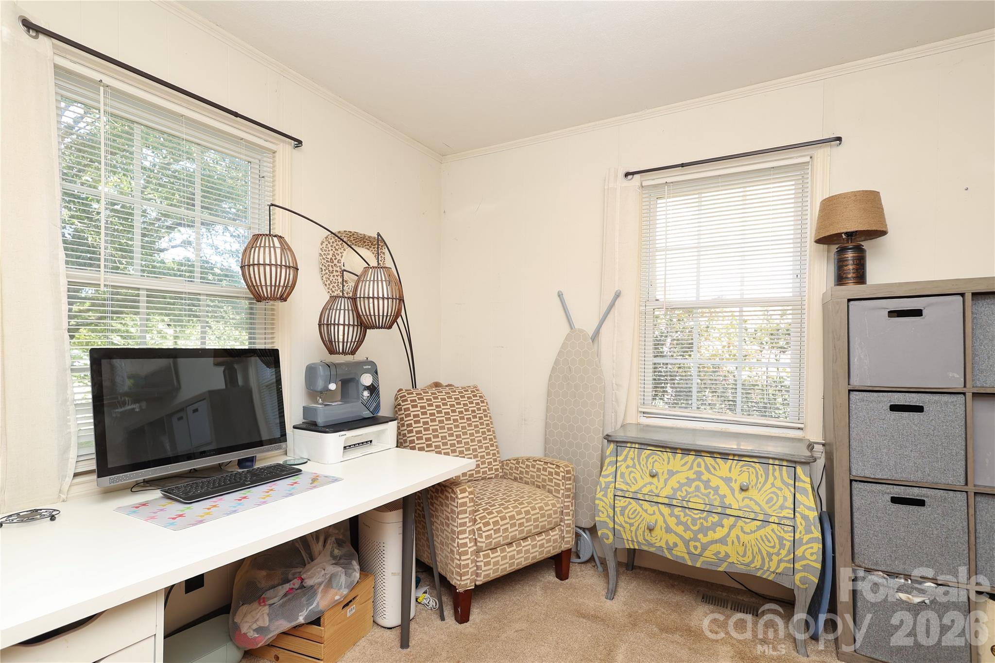 1324 State Rd S-29-496 Lancaster, SC 29720 - Photo 26 of 28 a living room with furniture a window and a fireplace