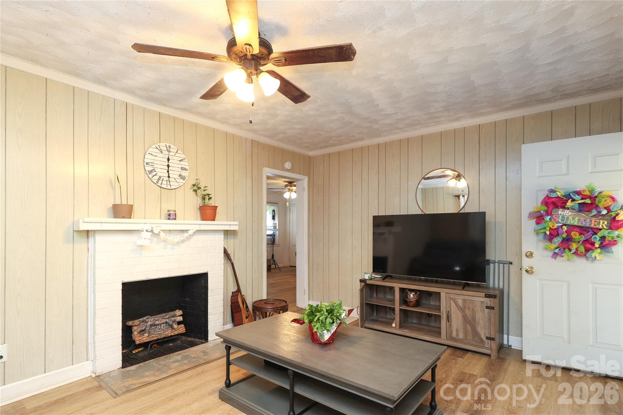1324 State Rd S-29-496 Lancaster, SC 29720 - Photo 3 of 28 a living room with furniture and a flat screen tv