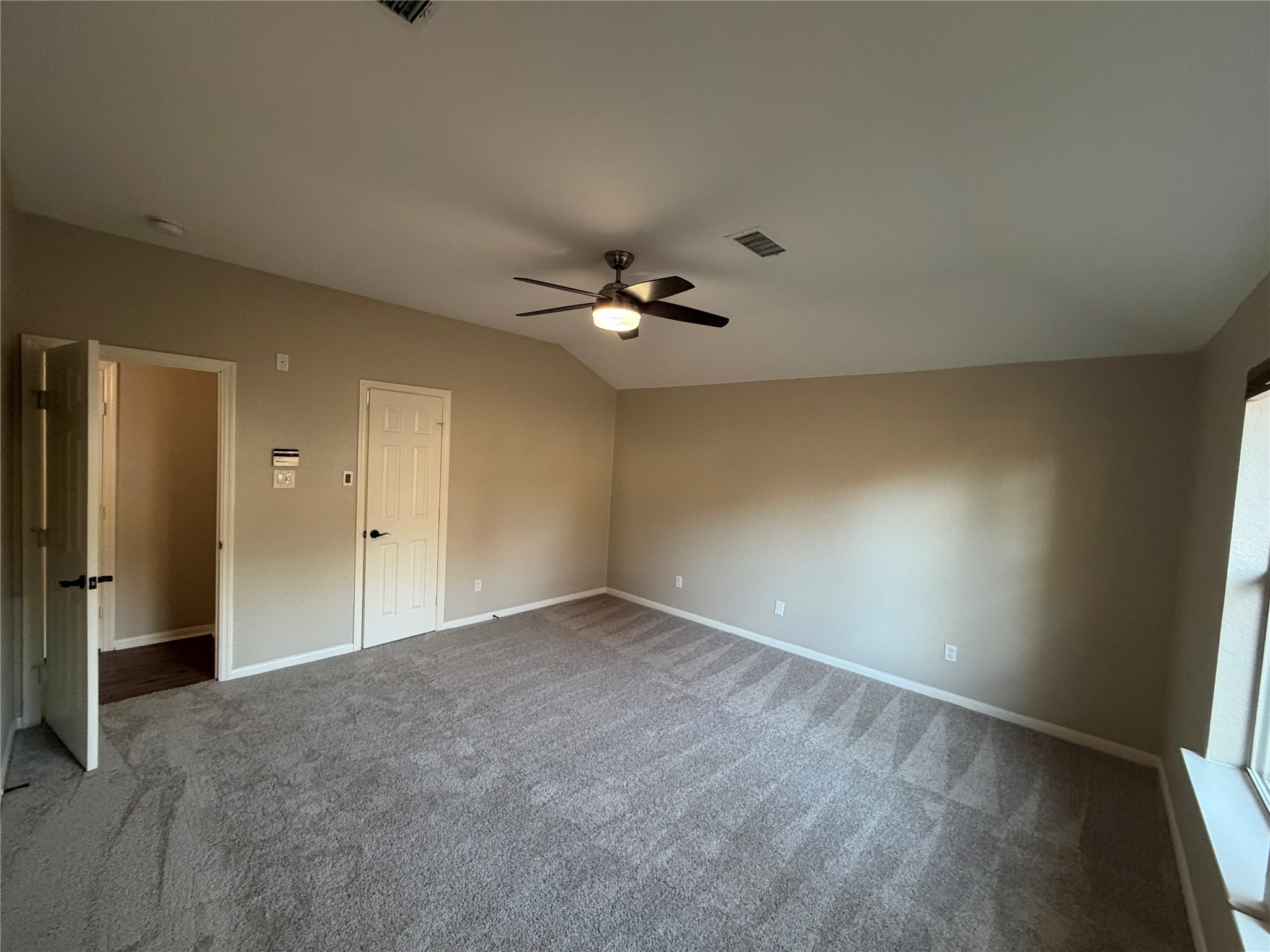 58 Shimmer Pond Place Conroe, TX 77385 - Photo 20 of 35 a view of an empty room