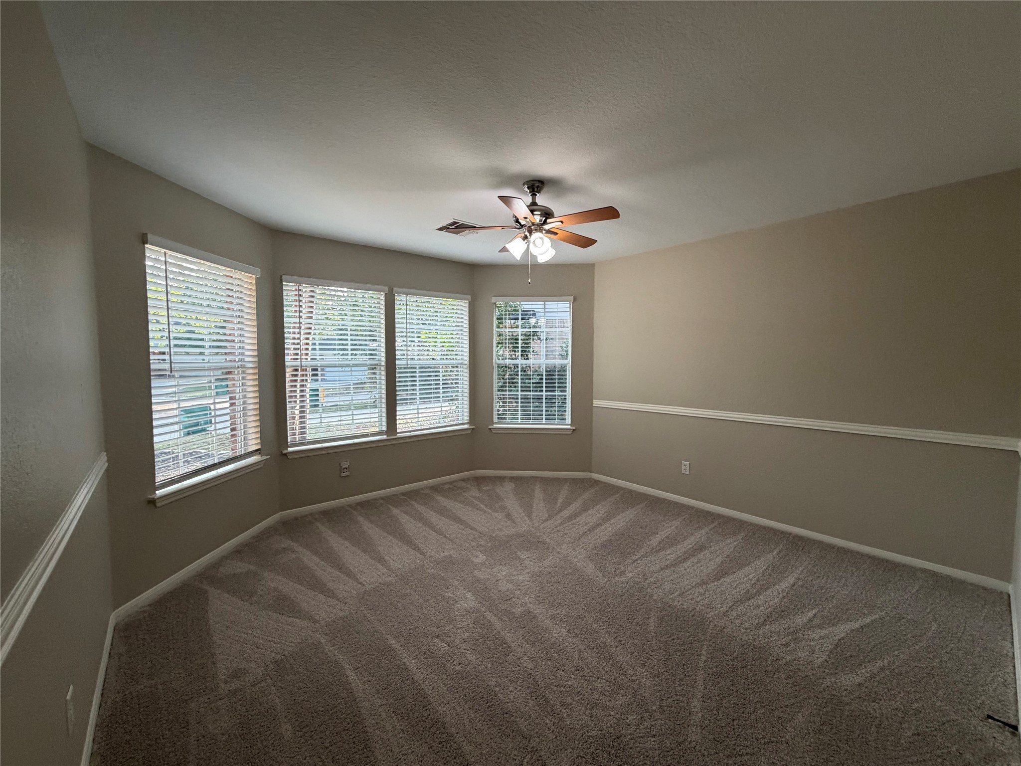58 Shimmer Pond Place Conroe, TX 77385 - Photo 25 of 35 a view of an empty room with a window
