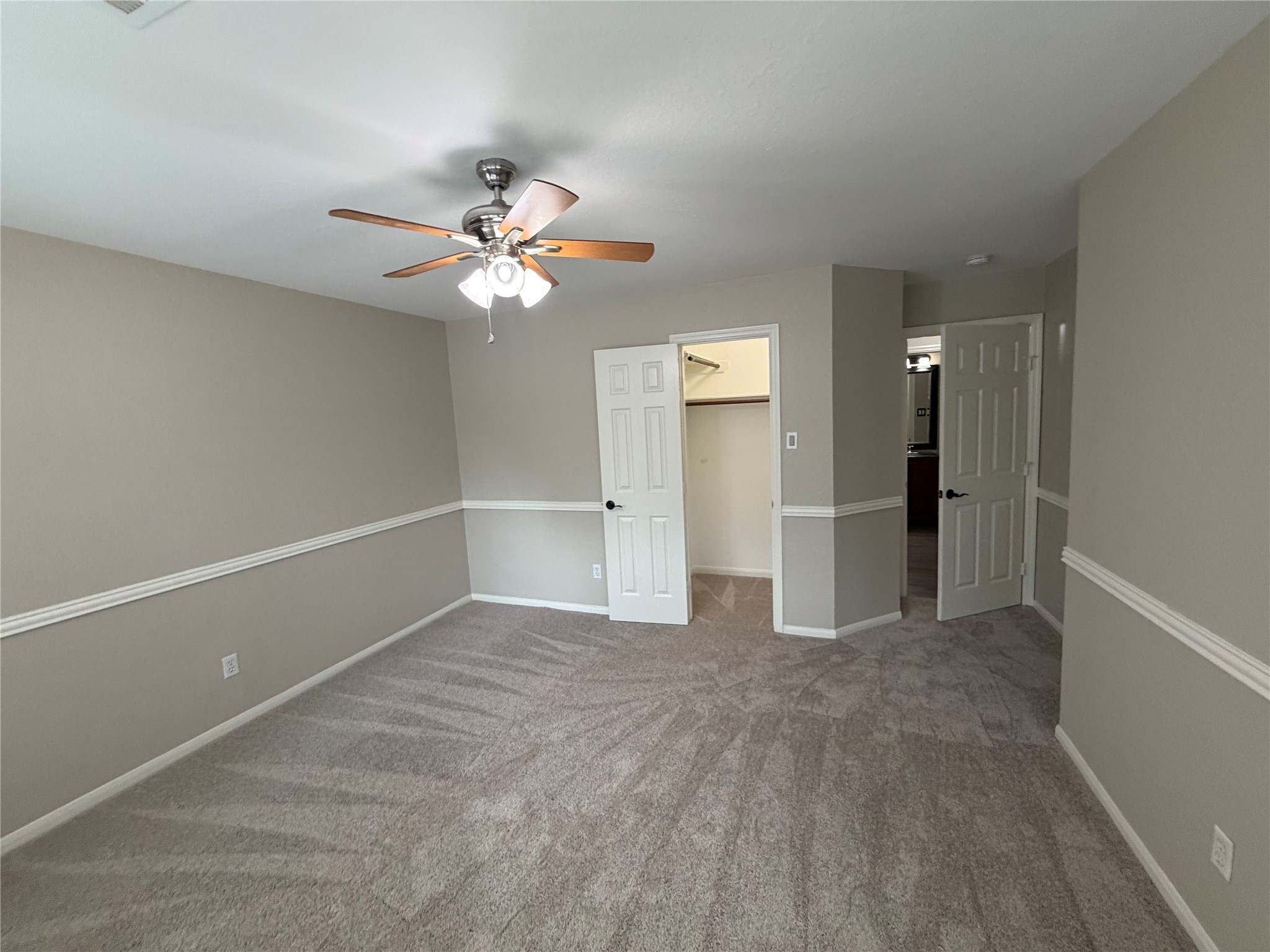 58 Shimmer Pond Place Conroe, TX 77385 - Photo 26 of 35 wooden floor in an empty room