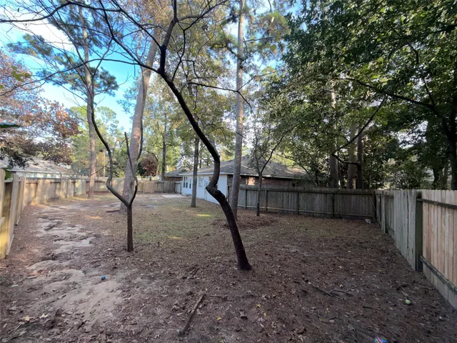 $345,000 | 58 Shimmer Pond Place, Conroe, TX 77385