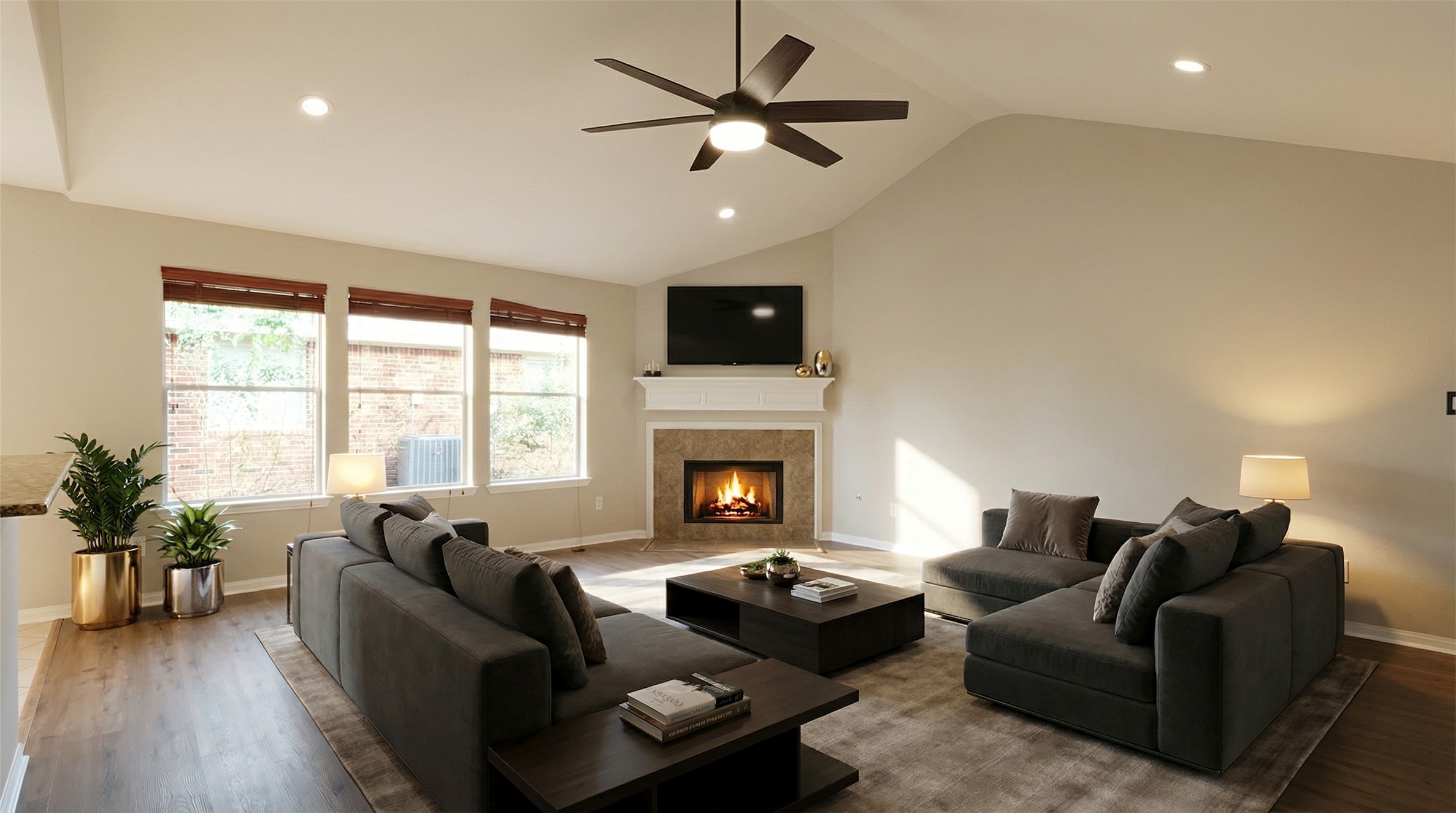 58 Shimmer Pond Place Conroe, TX 77385 - Photo 4 of 35 a living room with furniture and a fireplace