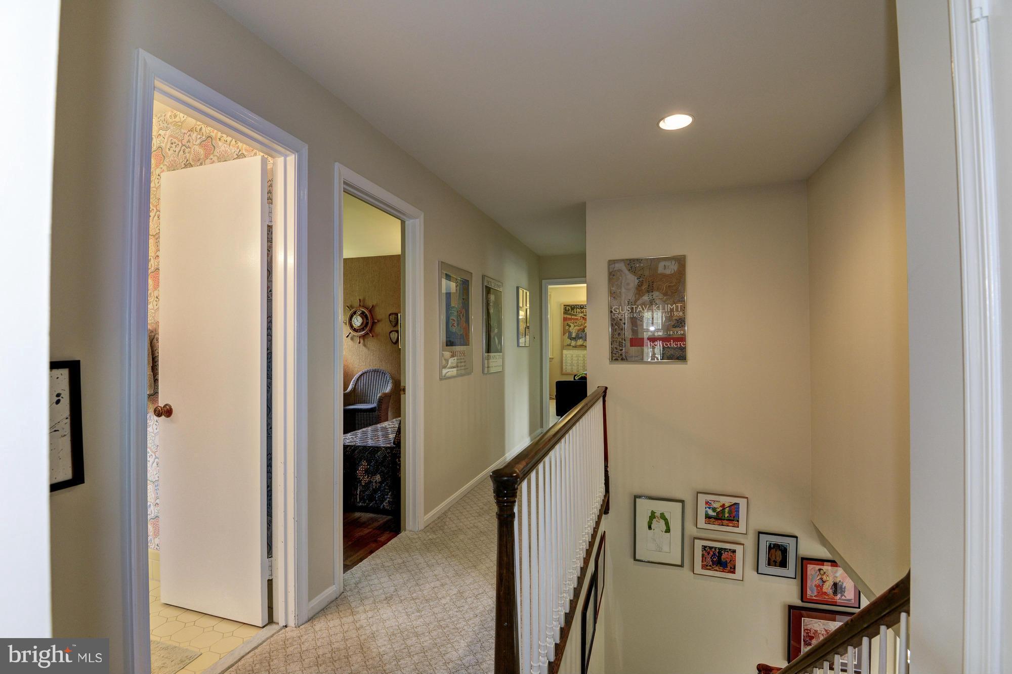 912 Kimberwicke Road McLean, VA 22102 - Photo 16 of 30 a view of a hallway with workspace and a window