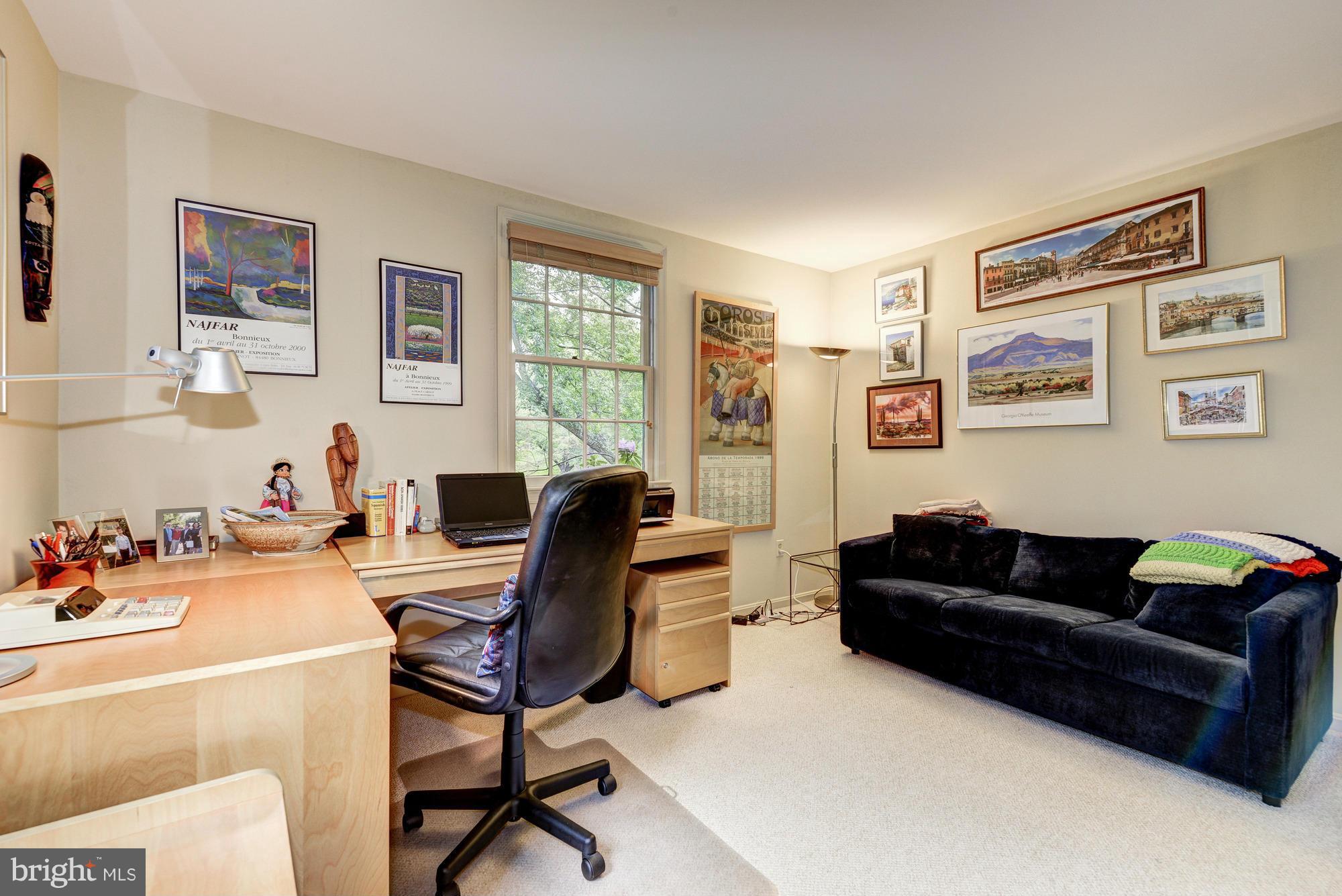 912 Kimberwicke Road McLean, VA 22102 - Photo 23 of 30 a view of a livingroom with workspace and a couch