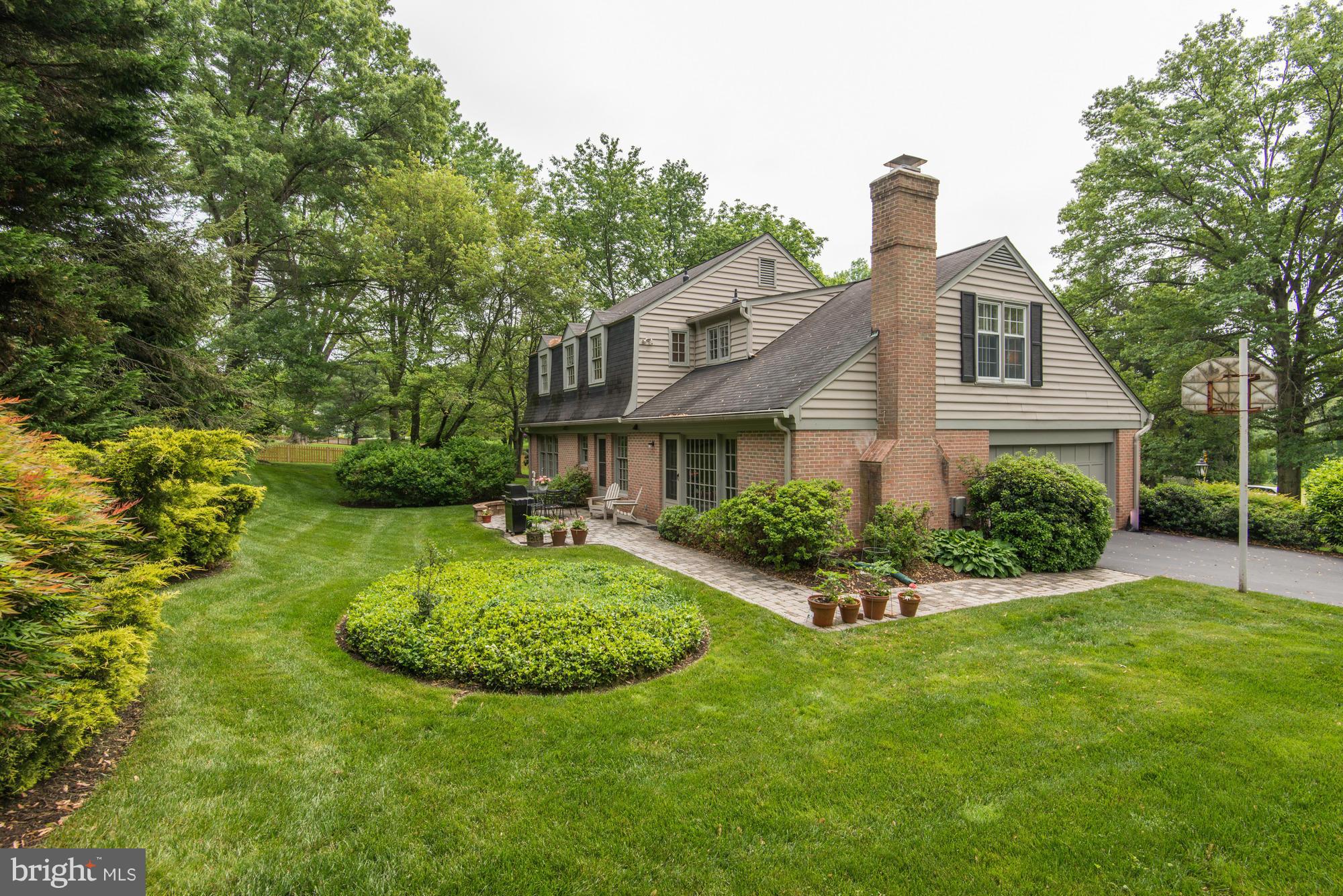912 Kimberwicke Road McLean, VA 22102 - Photo 28 of 30 a front view of a house with a yard