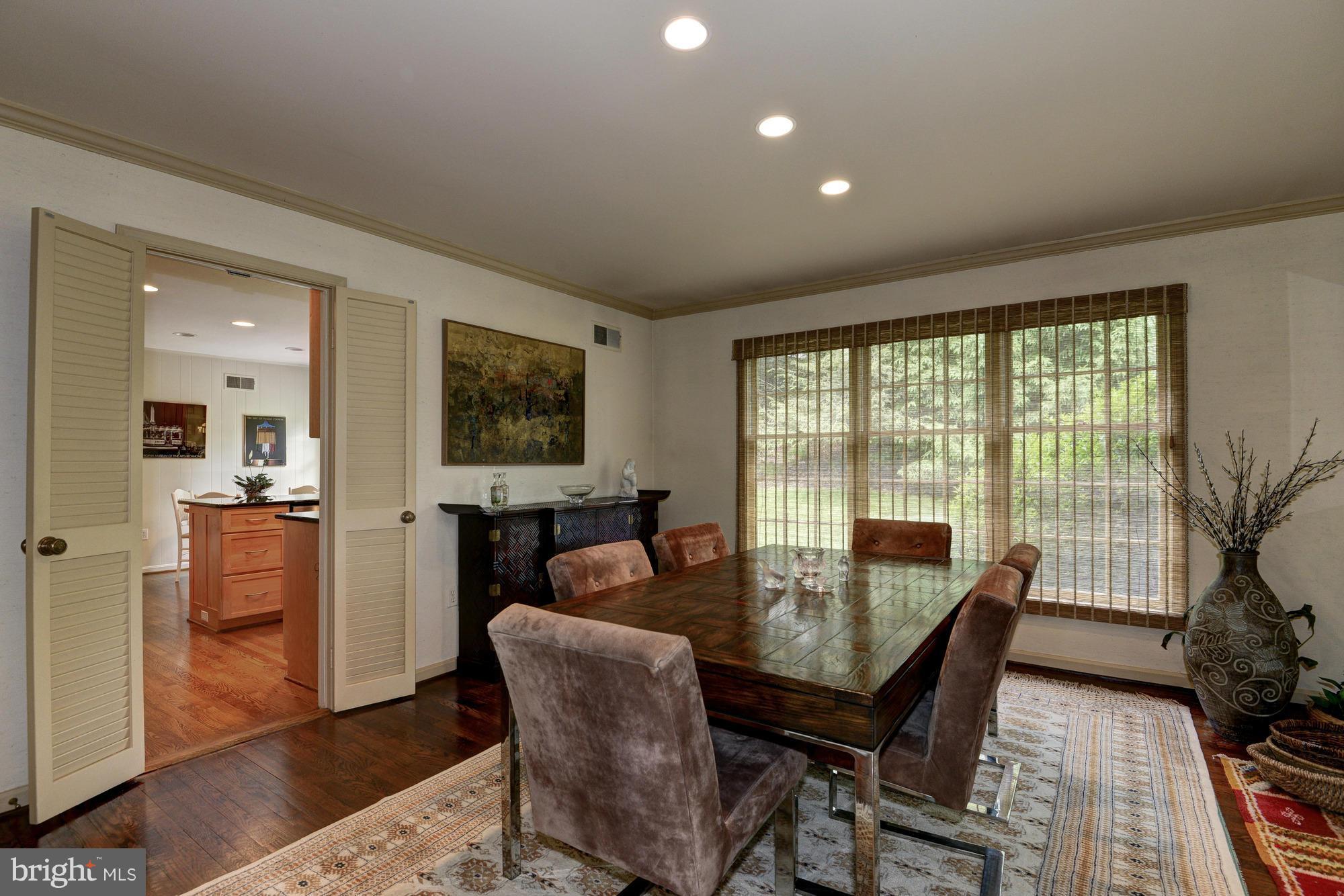 912 Kimberwicke Road McLean, VA 22102 - Photo 6 of 30 a dining room with furniture window and wooden floor