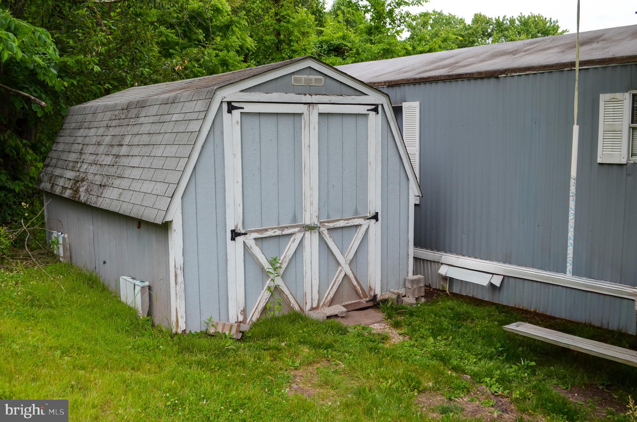 2001 Red Bank Road Dover, PA 17315 - Photo 8 of 19 a view of barn with a small yard and a large tree