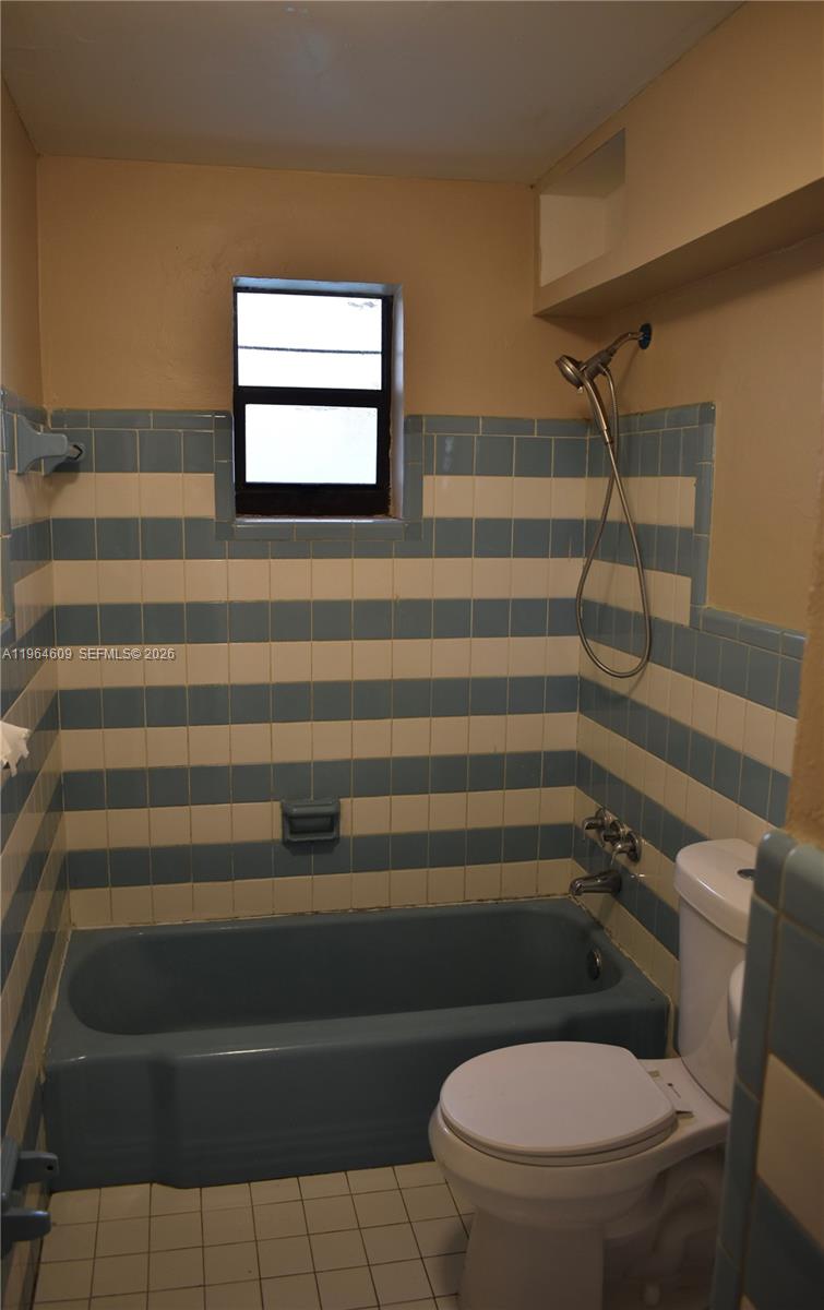 1622 Northwest 65th Street Miami, FL 33147 - Photo 5 of 6 a bathroom with a toilet and a shower