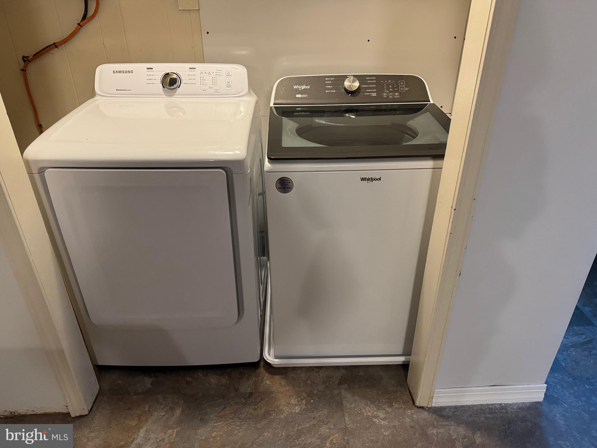 12924 Rousby Hall Road Lusby, MD 20657 - Photo 11 of 15 a utility room with dryer and washer