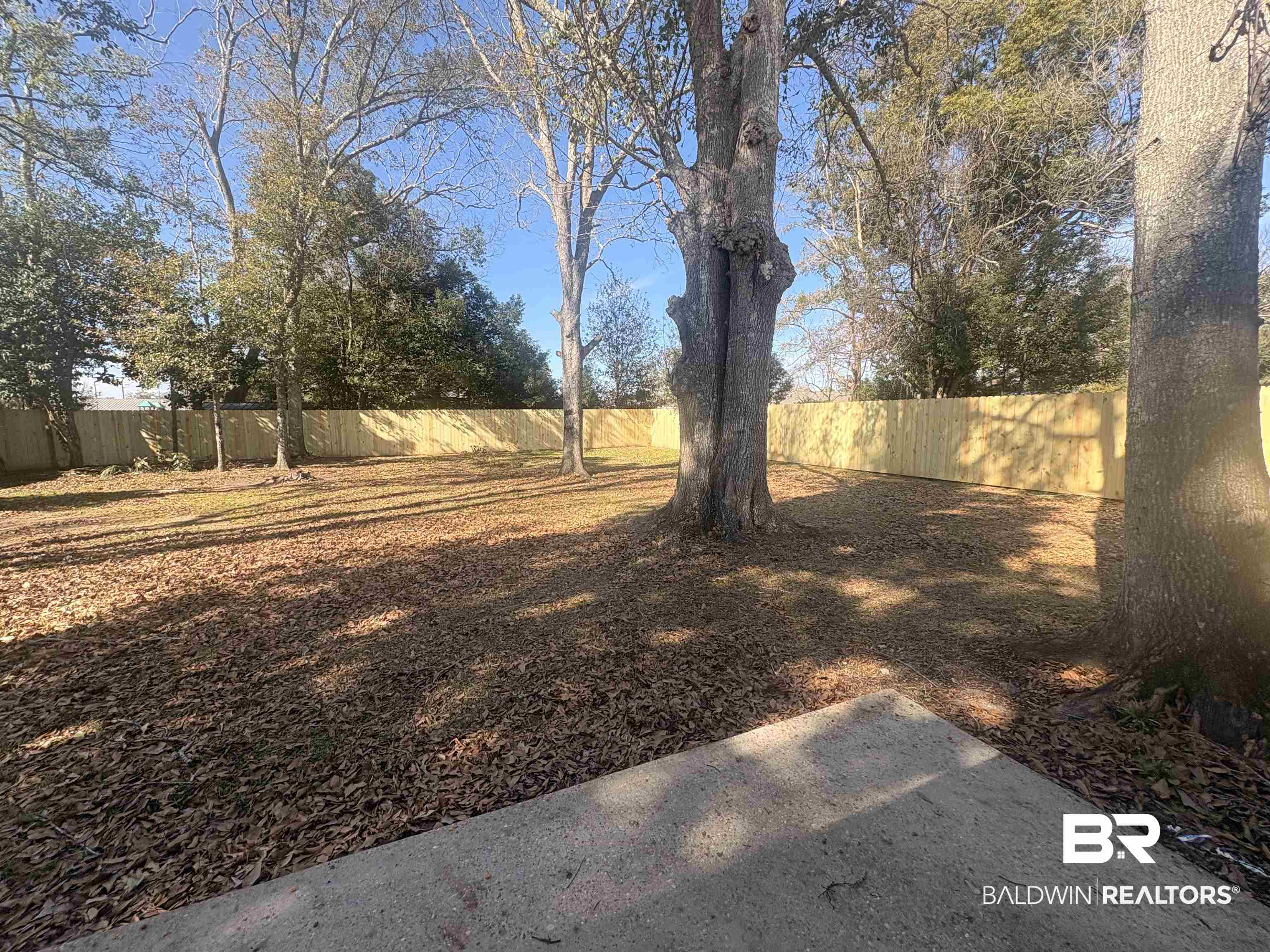 109-111 North Beech Street, Unit A & B Foley, AL 36535 - Photo 14 of 16 View of fenced yard