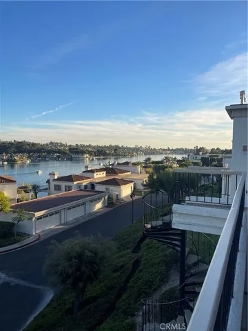 a sign that is sitting in front of flowers
