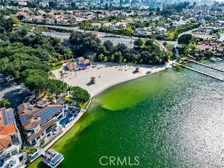 an aerial view of a city with ocean view