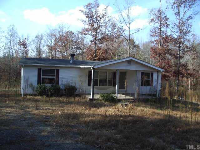 3263 M Walters Road Creedmoor, NC 27522 - Photo 1 of 1 a front view of a house with yard