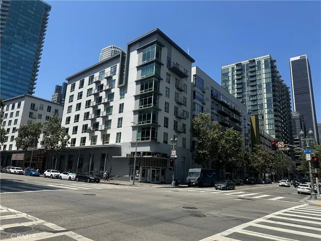 a view of a building with sitting area