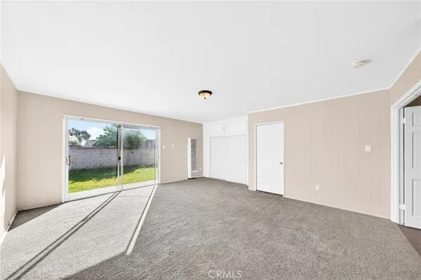 a bathroom with a toilet a sink and a mirror