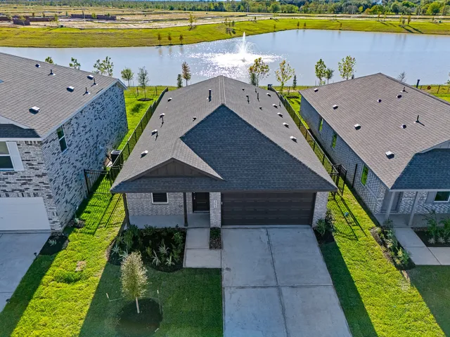 a aerial view of a house with a swimming pool