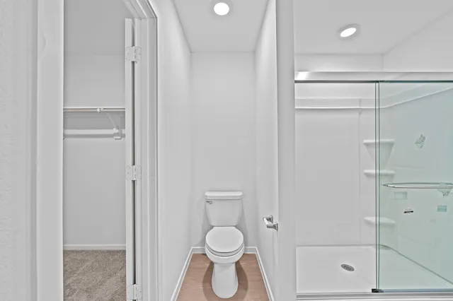 a view of a golf course with a lake view