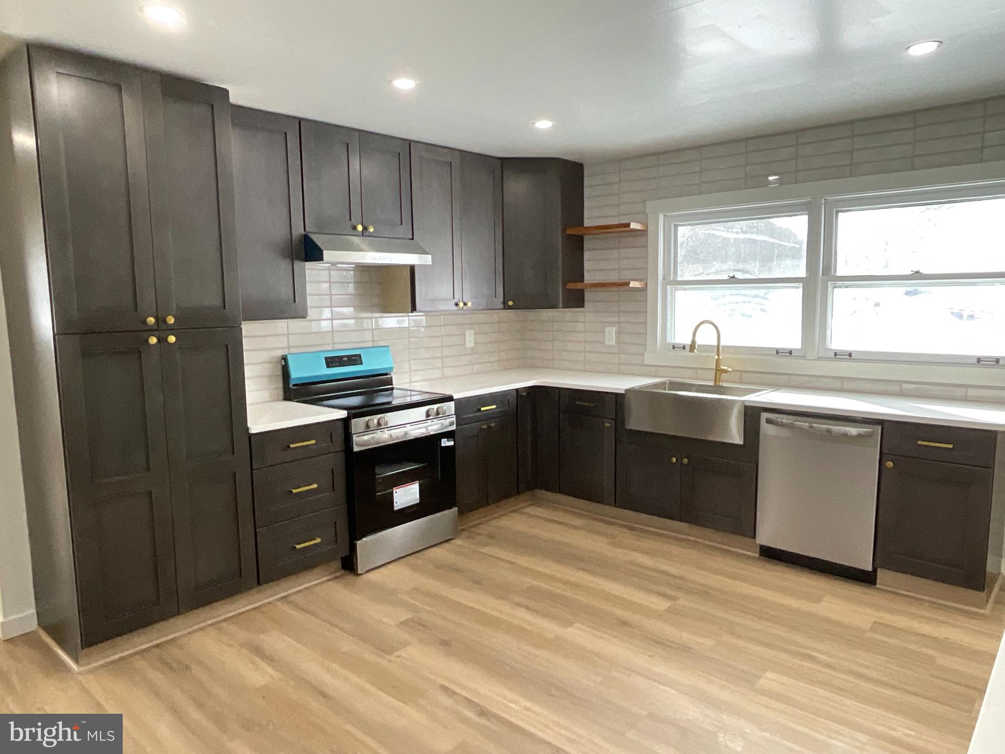 75 Center Road Lehighton, PA 18235 - Photo 17 of 57 Modern kitchen with sleek cabinetry and light.