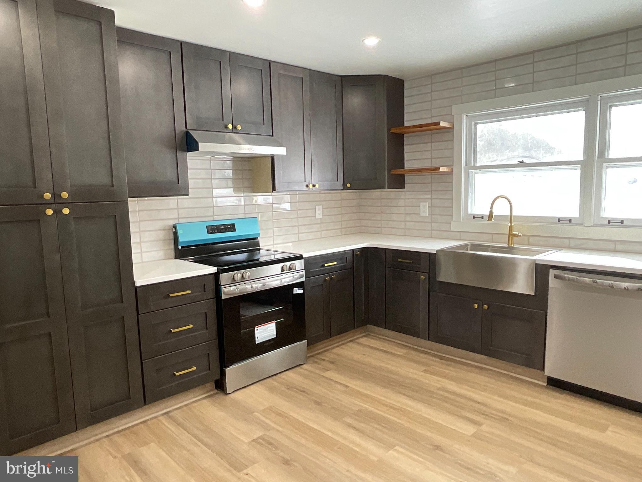 75 Center Road Lehighton, PA 18235 - Photo 18 of 57 Modern kitchen with sleek cabinetry and charm.