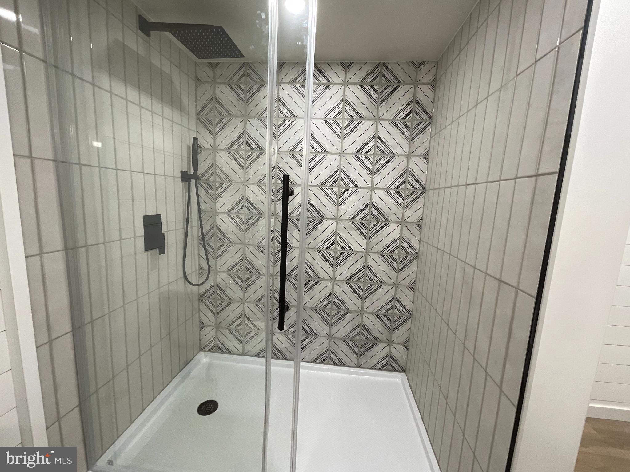 75 Center Road Lehighton, PA 18235 - Photo 45 of 57 Sleek shower with modern geometric tiles.