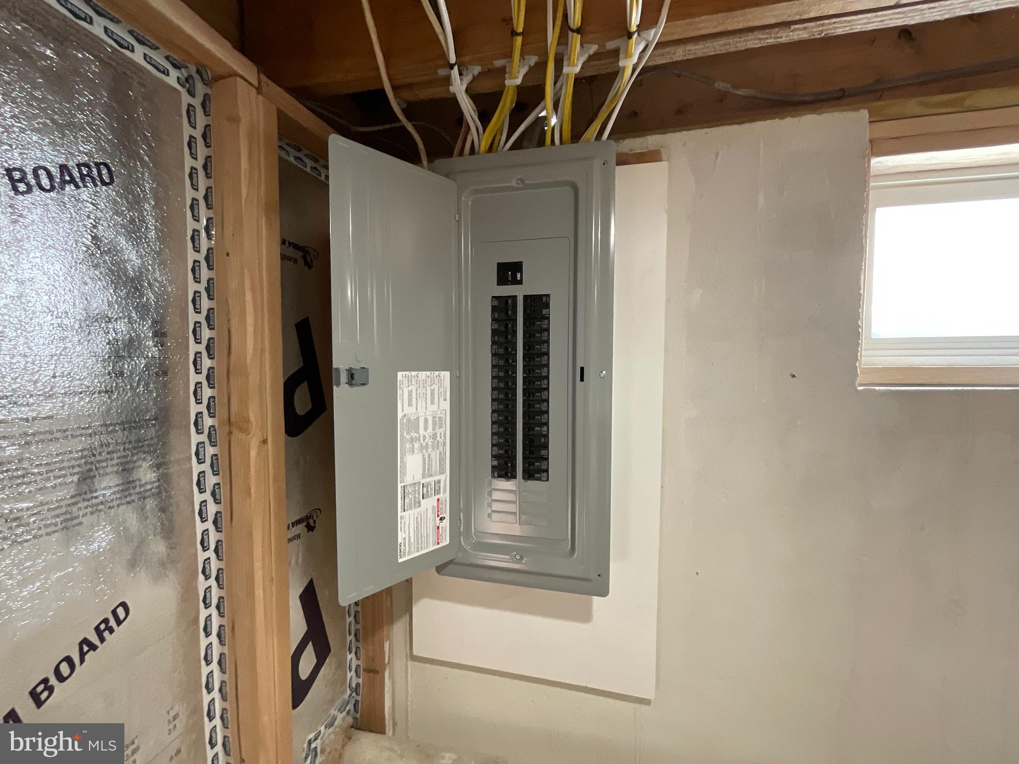 75 Center Road Lehighton, PA 18235 - Photo 50 of 57 Modern electrical panel in a basement setting.