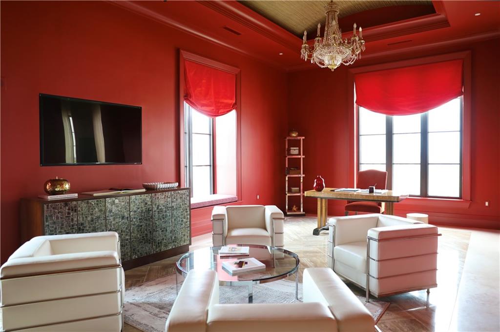 88 West Paces Ferry Road Northwest, Unit 1130 Atlanta, GA 30305 - Photo 14 of 43 a living room with furniture chandelier and a large window