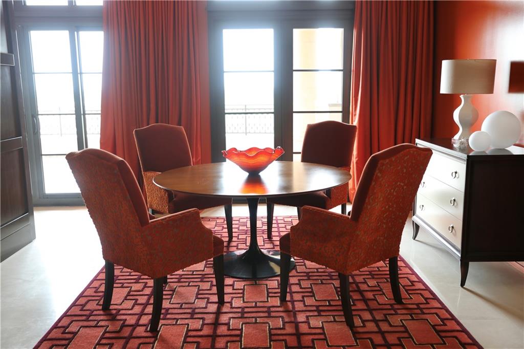 88 West Paces Ferry Road Northwest, Unit 1130 Atlanta, GA 30305 - Photo 16 of 43 a view of a dining room with furniture and window