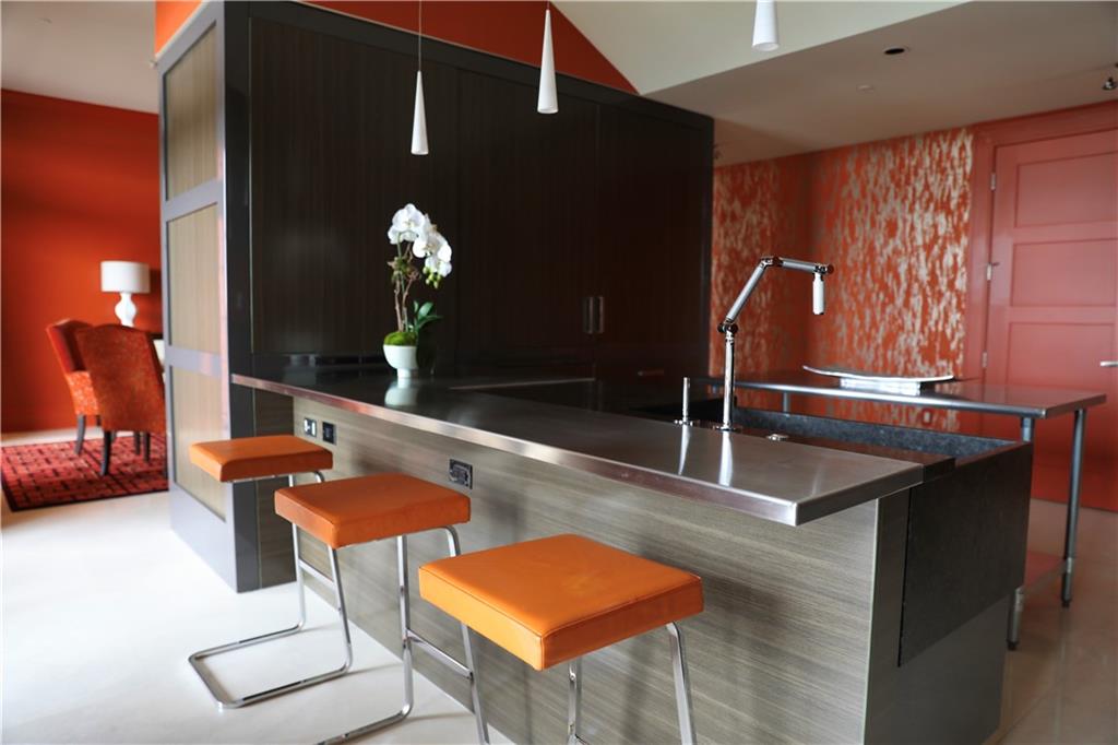 88 West Paces Ferry Road Northwest, Unit 1130 Atlanta, GA 30305 - Photo 20 of 43 a dining room with furniture and wooden floor