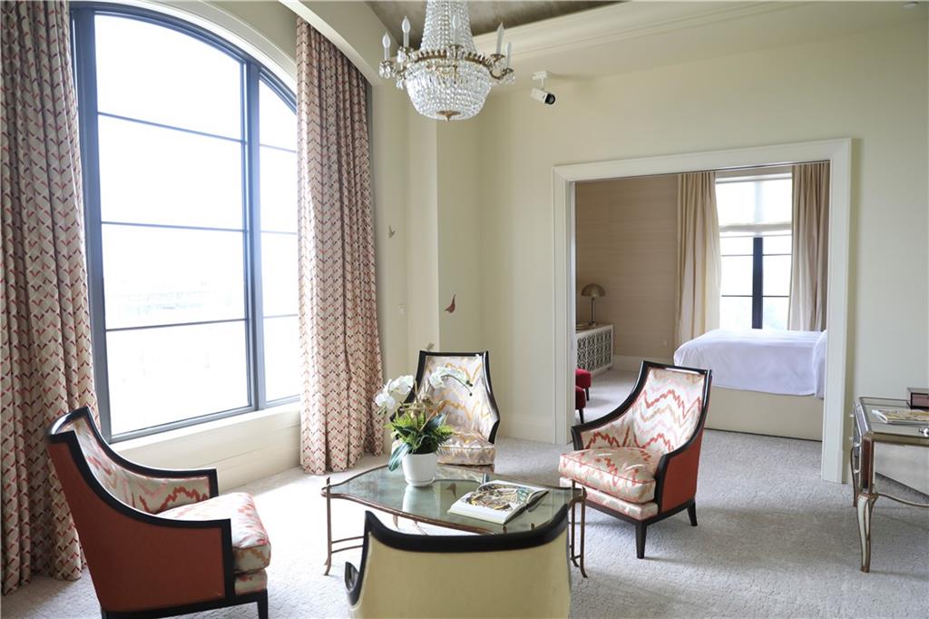 88 West Paces Ferry Road Northwest, Unit 1130 Atlanta, GA 30305 - Photo 24 of 43 a living room with furniture and a window