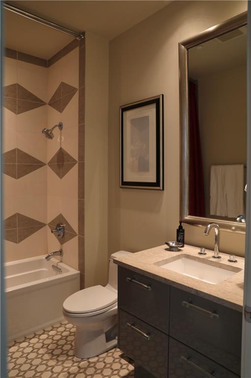 88 West Paces Ferry Road Northwest, Unit 1130 Atlanta, GA 30305 - Photo 32 of 43 a bathroom with a sink toilet and shower