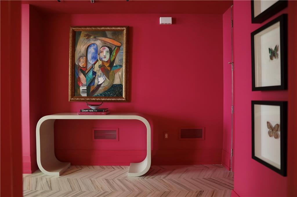 88 West Paces Ferry Road Northwest, Unit 1130 Atlanta, GA 30305 - Photo 5 of 43 a view of a red door and chair