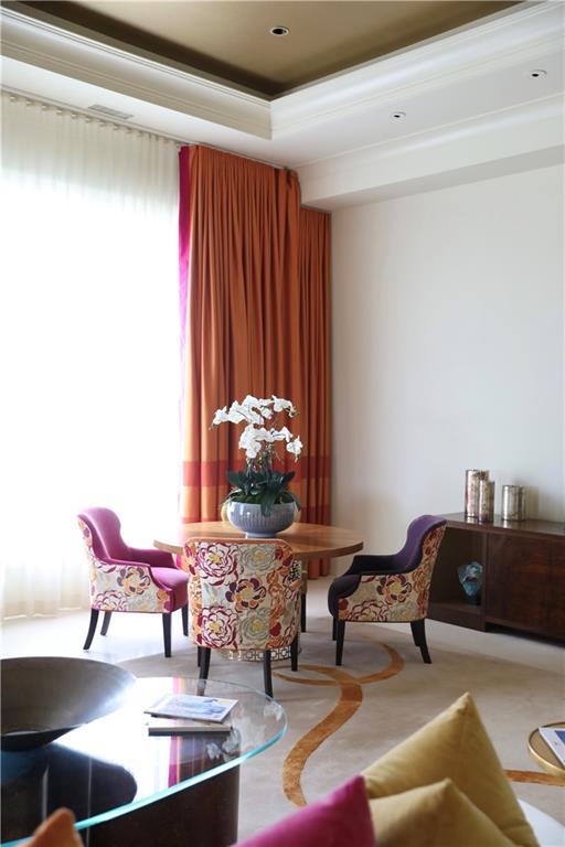 88 West Paces Ferry Road Northwest, Unit 1130 Atlanta, GA 30305 - Photo 6 of 43 a living room with furniture and rug