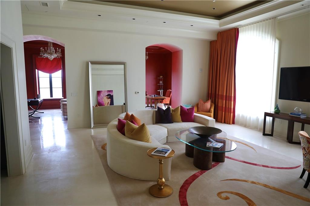 88 West Paces Ferry Road Northwest, Unit 1130 Atlanta, GA 30305 - Photo 8 of 43 a living room with furniture fireplace and flat screen tv