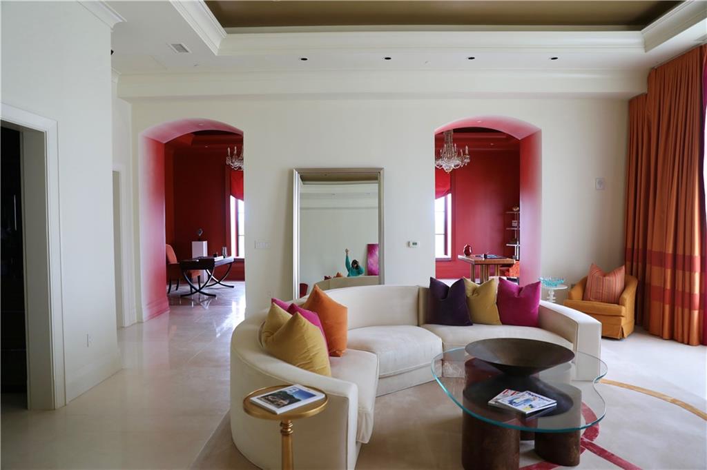 88 West Paces Ferry Road Northwest, Unit 1130 Atlanta, GA 30305 - Photo 10 of 43 a living room with furniture and a large window