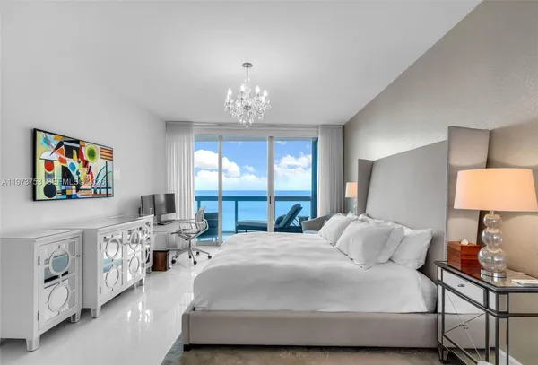 a bathroom with a bathtub and a toilet