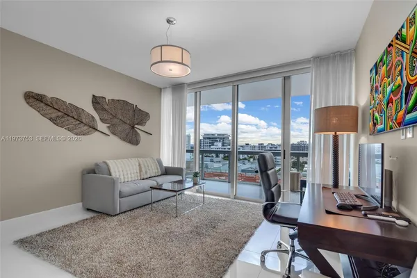 a bathroom with a double vanity sink mirror and shower