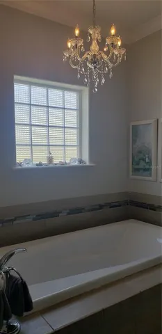 a white toilet sitting next to a window