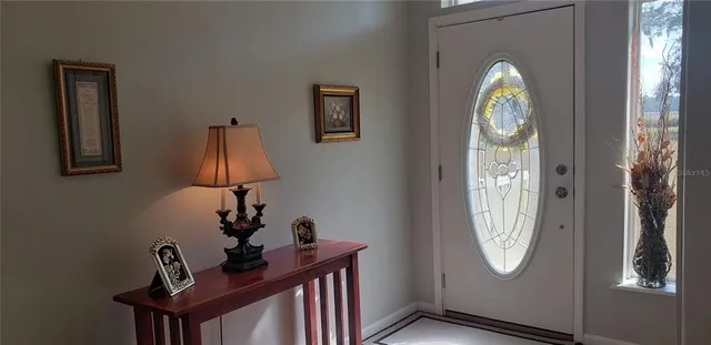 a view of entryway with wooden floor