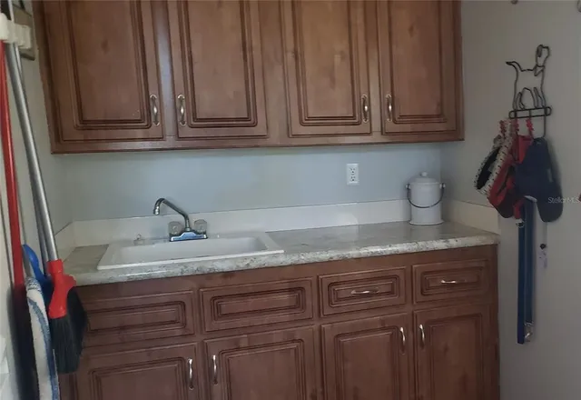 a view of a balcony with furniture