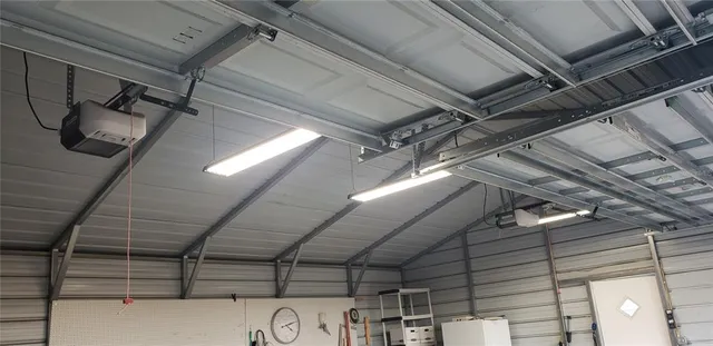 a view of a room with wooden stairs